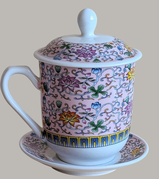 Decorative mug with colorful floral patterns on a beige background